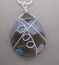 Smoke Glass Pendant Necklace Wrapped in Silver Wire from Joseph Genuardi Florist in Norristown, PA